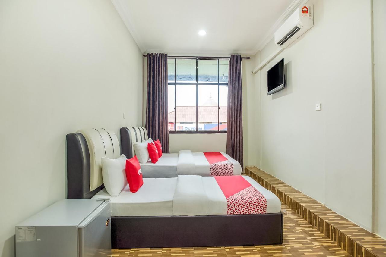 Oyo 89712 Grand Inn Semporna Buitenkant foto