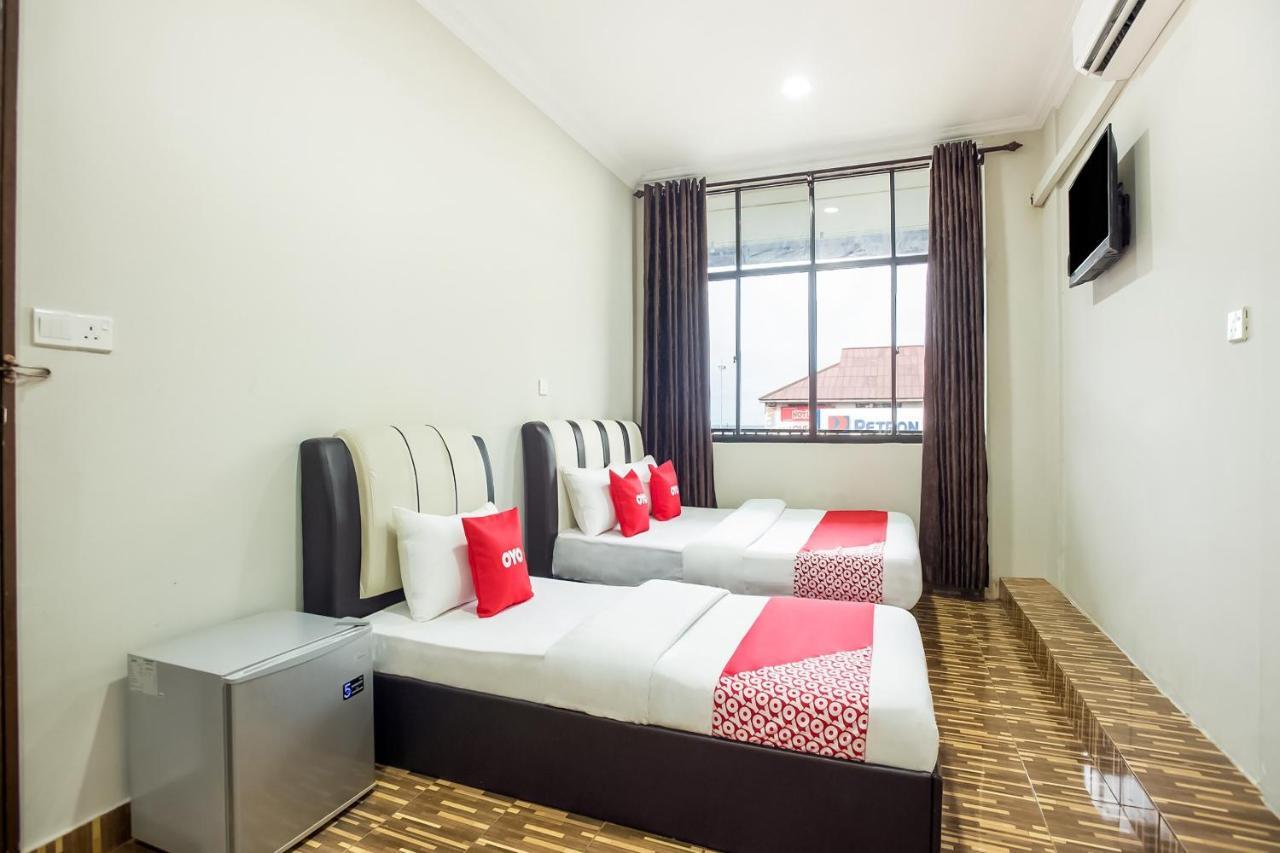 Oyo 89712 Grand Inn Semporna Kamer foto